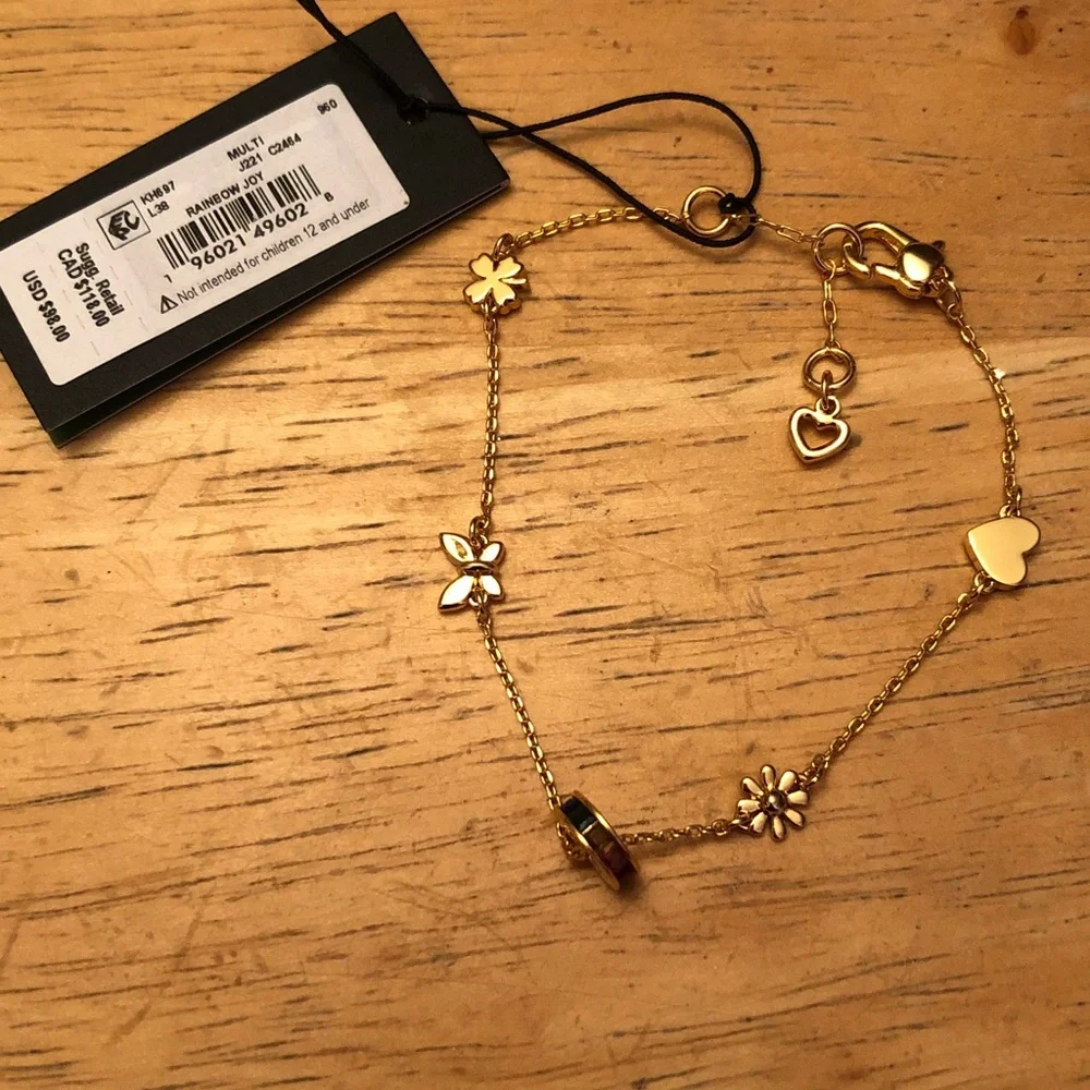 Kate Spade Gold Tone Rainbow Joy Charm Bracelet Heart, Flower, Clover NWT - Picture 2 of 12